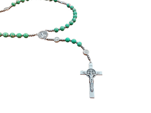 Quality of Our Lady As Illustrated by the Medal • Mother — Her open arms, the "recourse" we have in her. • Immaculate — The words, "conceived without sin." • Assumed into Heaven — She stands on the globe. • Mediatrix — Rays from her hands symbolizing "graces." • Our Protection — Crushes the serpent (Gn 3:15).